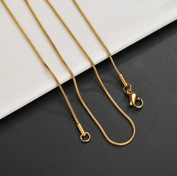 sleek_golden_round_snake_herringbone_neck_chain_1mm_and_50_inches_for_men_in_Pakistan_3_4
